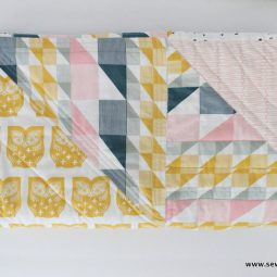 Half Square Triangle Quilt Pattern - Scandinavian Heartland | This half square triangle quilt pattern is quick and easy. It is great for beginners who are hesitant to start quilting! Click through for the full tutorial! www.sewwhatalicia.com