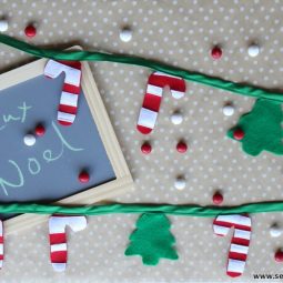 Candy Cane Felt Christmas Garland: This is a quick and easy garland tutorial that is great for hanging all over the house! Try it on your tree or over the mantle. Click through for the full tutorial and a free cut file. | www.sewwhatalicia.com