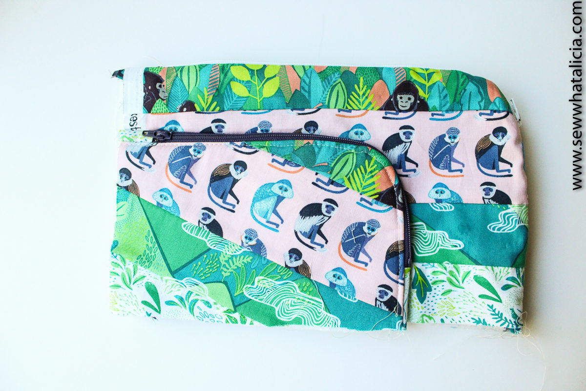 Wallet Clutch Zipper Pouch Tutorial: This cute little wallet clutch is a great project for spring break and summer! Click through for the full tutorial to make your own! | www.sewwhatalicia.com