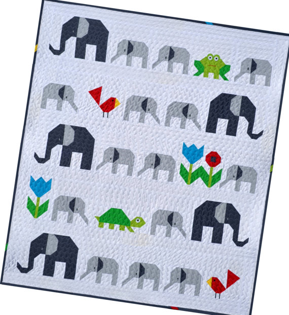 pictured quilt with elephants and frogs