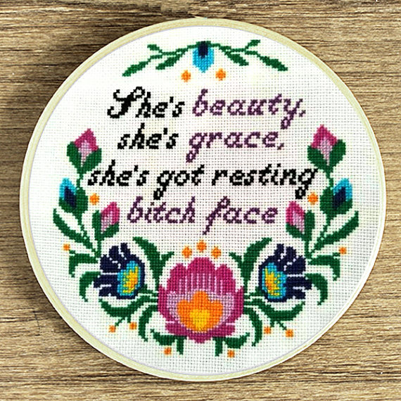 pictured cross stitch hoop with words she's beauty she's grace she's got resting bitch face