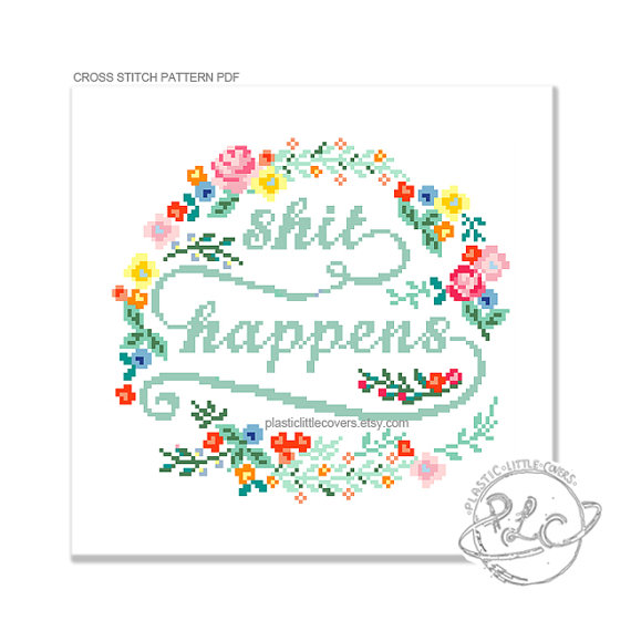 pictured cross stitch pattern reading shit happens with floral frame