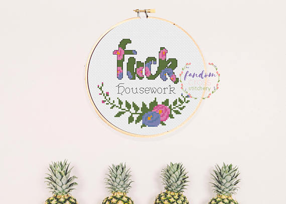 pictured cross stitch hoop with words fuck housework