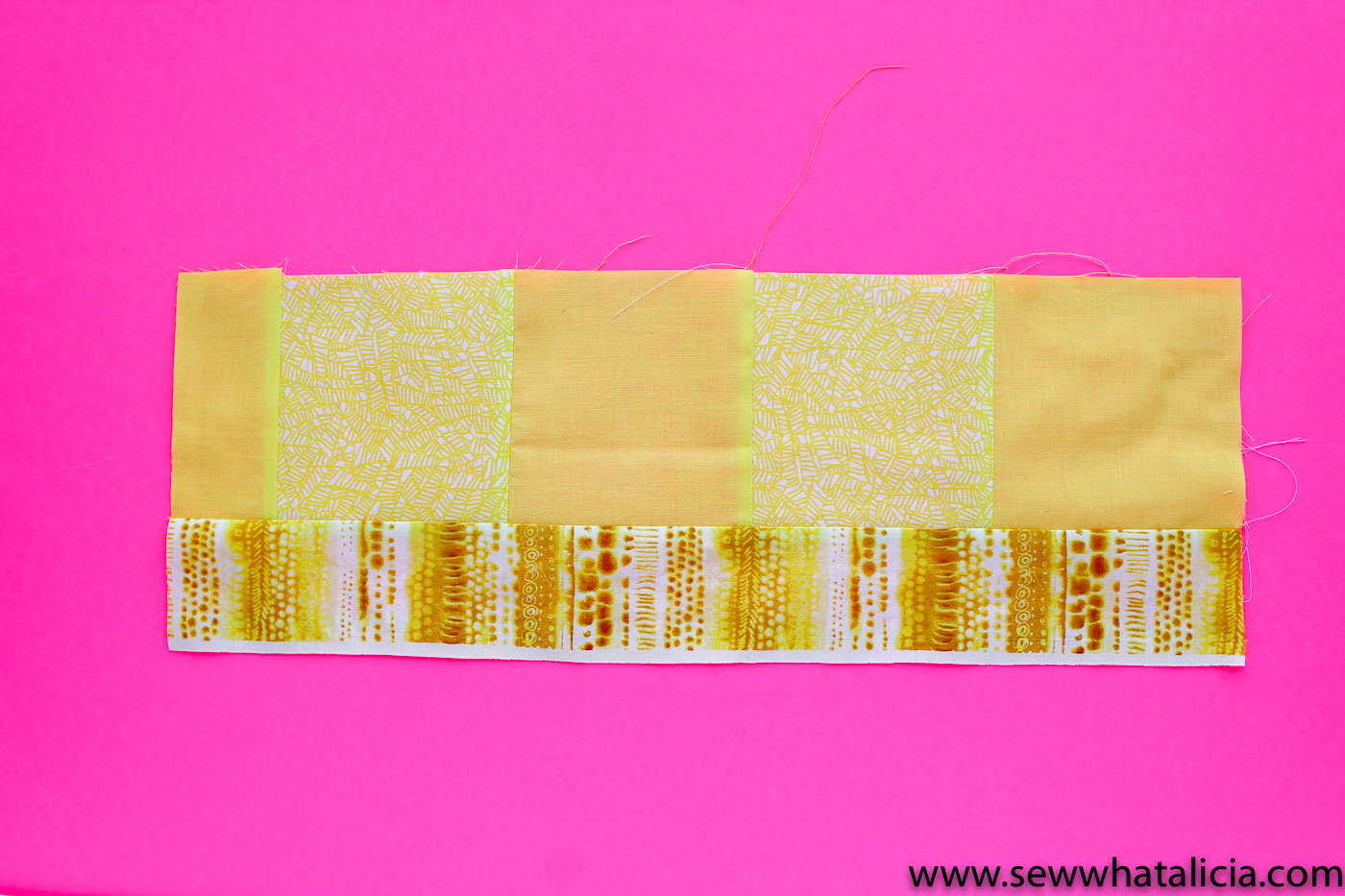 Scrappy Easy Rainbow Quilt Pattern and Tutorial: Pictured strips and squares of yellow pieced together to make a long yellow strip. | www.sewwhatalicia.com