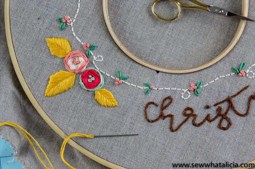 How to Embroider a Christmas Wreath: This Christmas wreath is so pretty! Learn how embroider this wreath with a walkthrough on all the different stitches used. Click through for the full tutorial and supply list. #sewwhatalicia #embroidery | www.sewwhatalicia.com