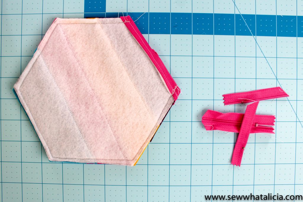 How to Use a Zipper Foot: If you have been dragging your feet about learning how to install a zipper this post is for you! Here is everything you need to know about using a zipper foot! Plus you won't want to miss the super cute fringe pouch! Click through for everything you need to know! | www.sewwhatalicia.com
