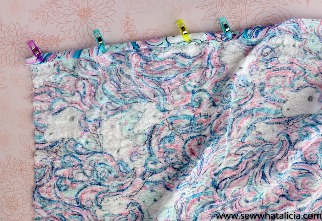 Easy Gauze Fabric Baby Receiving Blankets: These baby swaddle blankets are so easy to make. This tutorial will teach you all about double gauze fabric and have you creating your own receiving blankets in no time. Click through for the tutorial and supplies. | www.sewwhatalicia.com