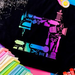 Pictured: closeup of the sewing machine cut file cut using rainbow HTV.